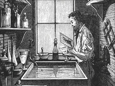 Sketch illustration of a photographer completing steps of the wet plate collodion process of photography