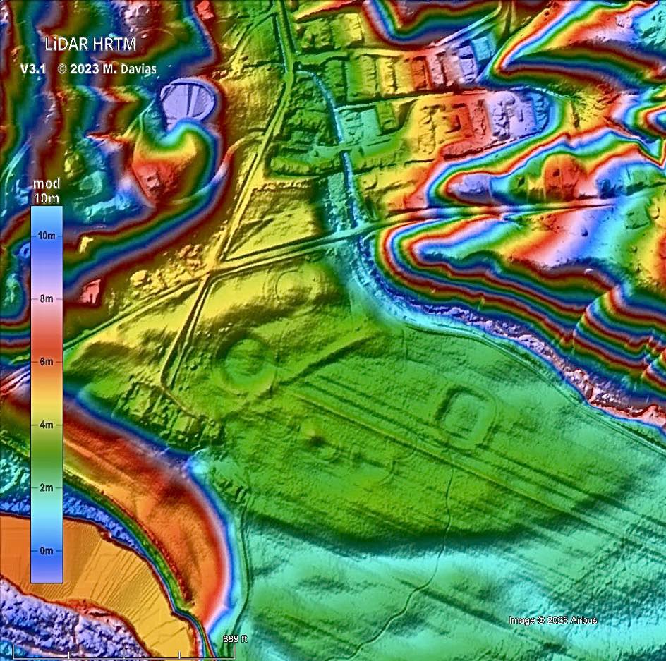 LiDAR-derived elevation visualization showing subtle topographic features and geometric earthwork forms highlighted through color-shaded relief.