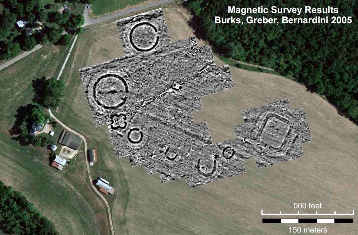 Magnetic survey overlay showing circular and geometric subsurface features at the Junction Earthworks site, mapped over a modern aerial landscape.