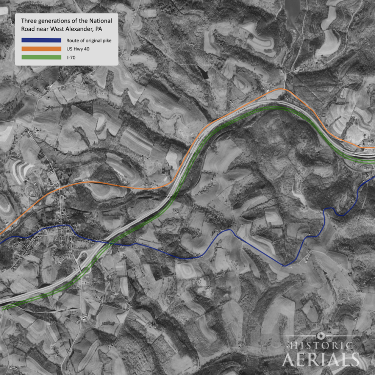 Labeled historic aerial image showing three generations of the National Road near West Alexander, Pennsylvania, including the original pike, U.S. Route 40, and Interstate 70.