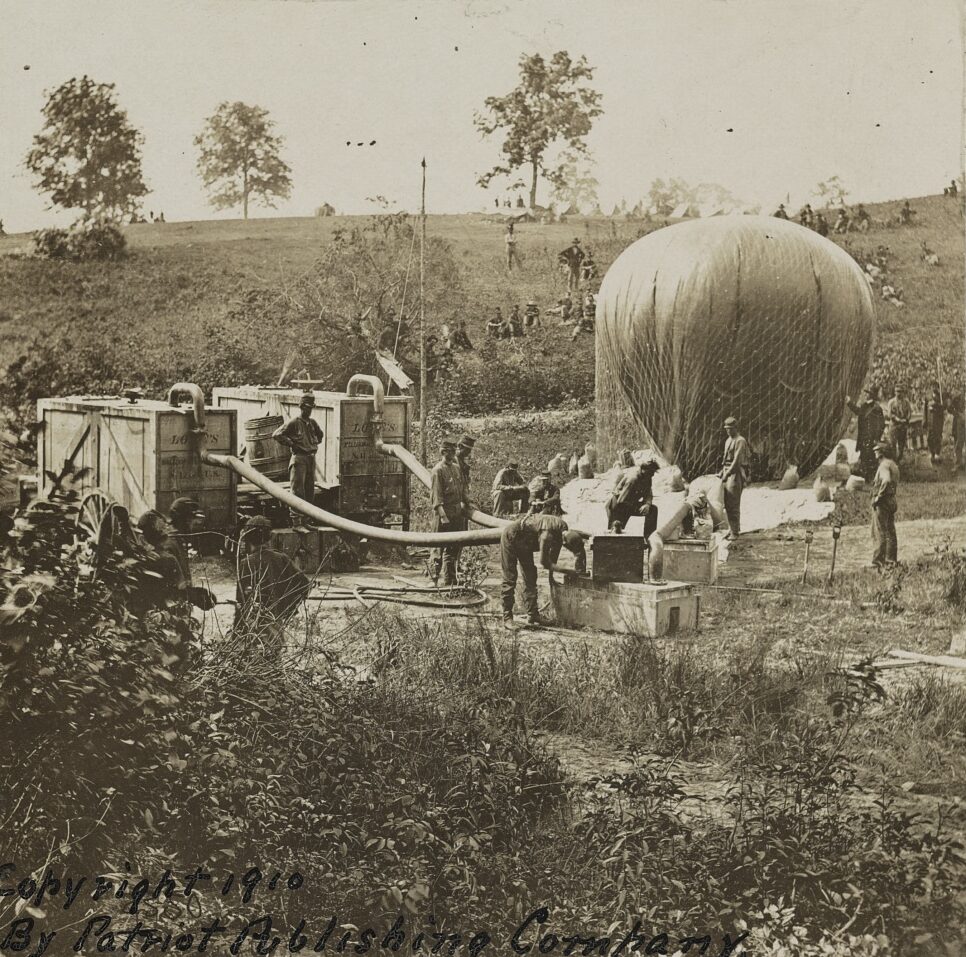Civil War soldiers using portable gas generators to inflate Professor Thaddeus Lowe’s military observation balloon near Gaines Mill, Virginia.