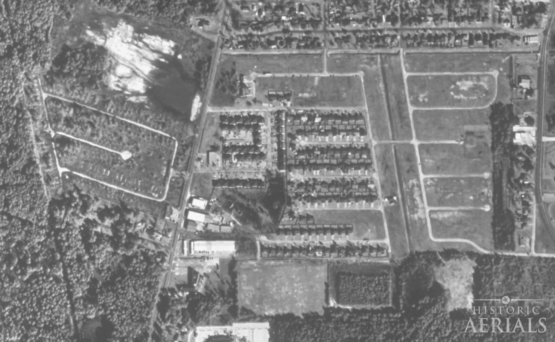 1995 aerial image showing former trailer park site cleared of structures in Humble, Texas.