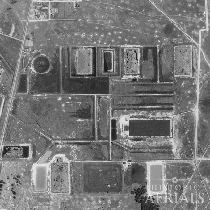 1930 aerial view of industrial oil tank pits and facilities in Humble, Texas before residential development.