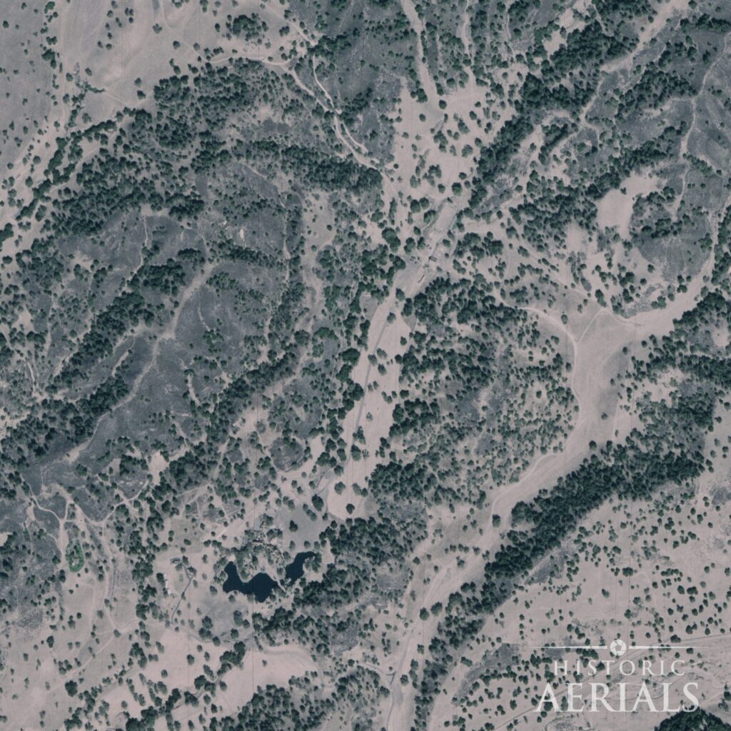 Aerial view of the Sycamore Valley estate, Los Olivos, California, 1981, with a new lake and building cluster at lower left.