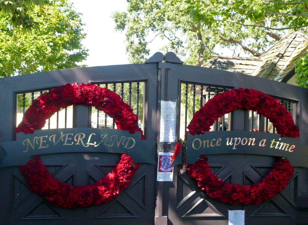 The gilded "Neverland" entrance gates with crown emblem at Michael Jackson's former ranch, Los Olivos, California.
