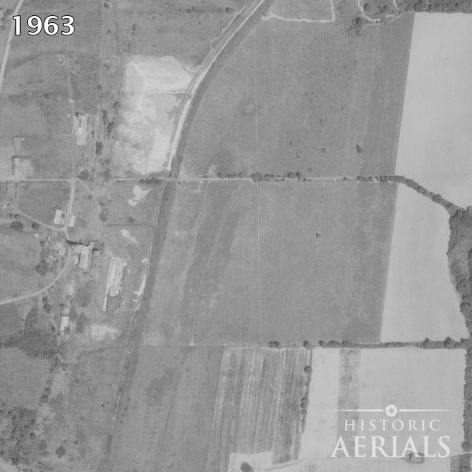 Animated time-lapse of aerial photographs of farmland and a farmstead in the Genesee Valley, New York, beginning with a black-and-white 1963 frame.